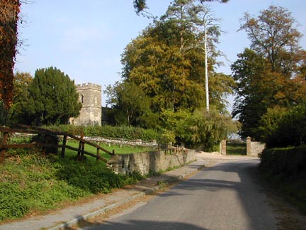 Fifehead church on left.  Entrance gate to the manor in front